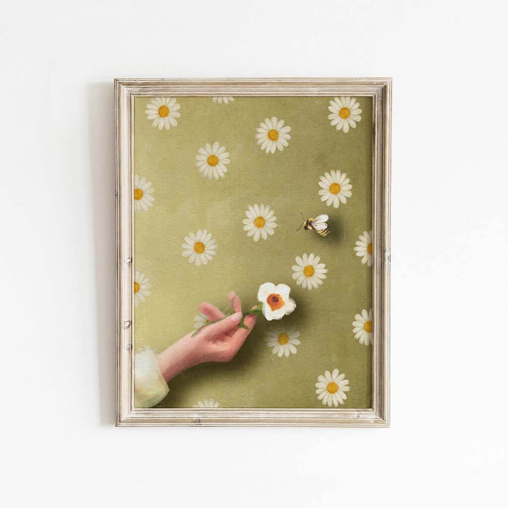 Vintage style illustration of a woman holding out a white flower to a bee, set against a green wallpaper with many daisies on it by artist Leah Straatsma.
