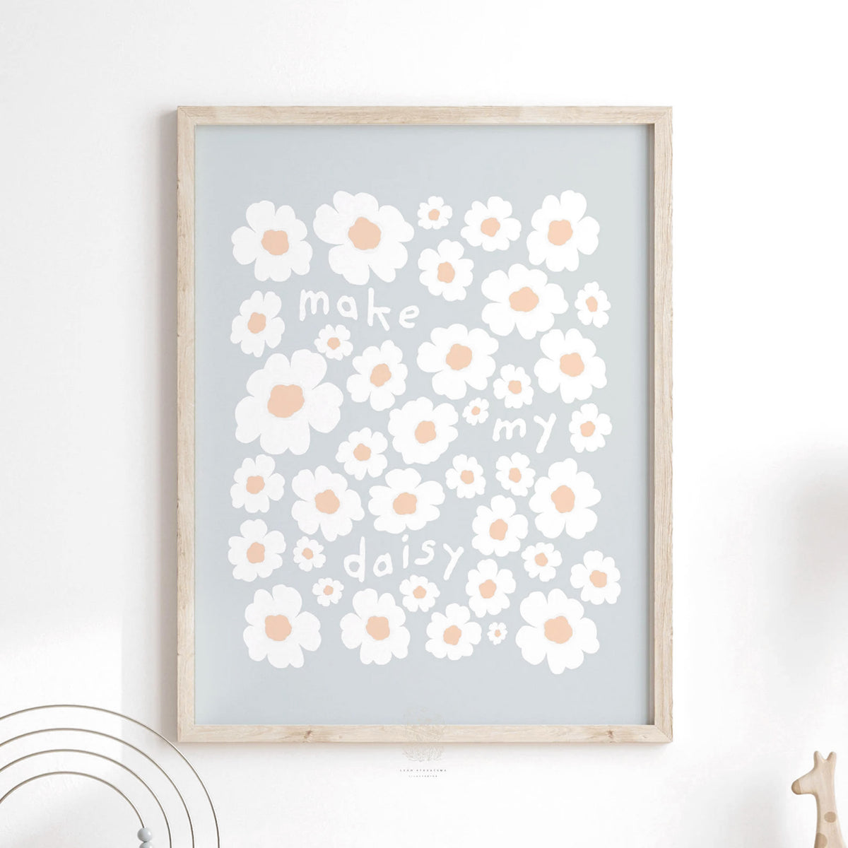 Pastel daisy art print featuring hand-drawn white and peach flowers with soft blue background, styled in a vintage wood frame—ideal for light, whimsical spaces.