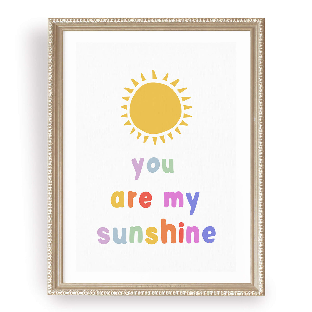 Bright and cheerful &#39;You are my sunshine&#39; print with a vibrant yellow sun and rainbow-colored text, ideal for uplifting any space, by Leah Straatsma
