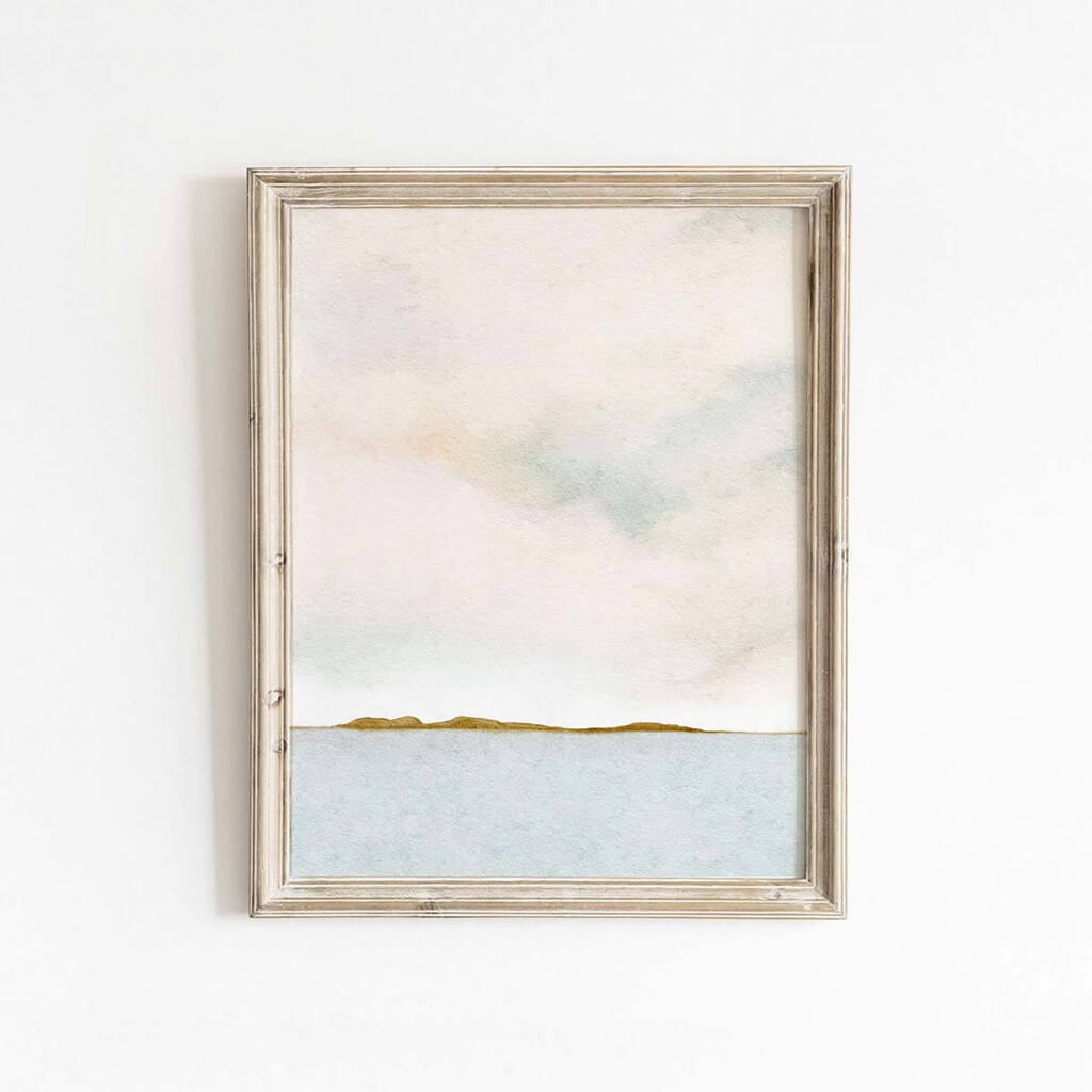 Tranquil watercolour of a lake, hills and cloudy sky by Leah Straatsma