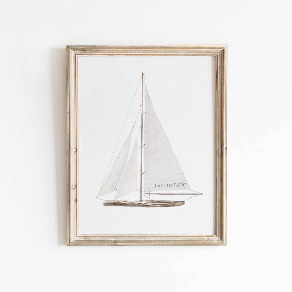 Watercolor painting of a driftwood sailboat.