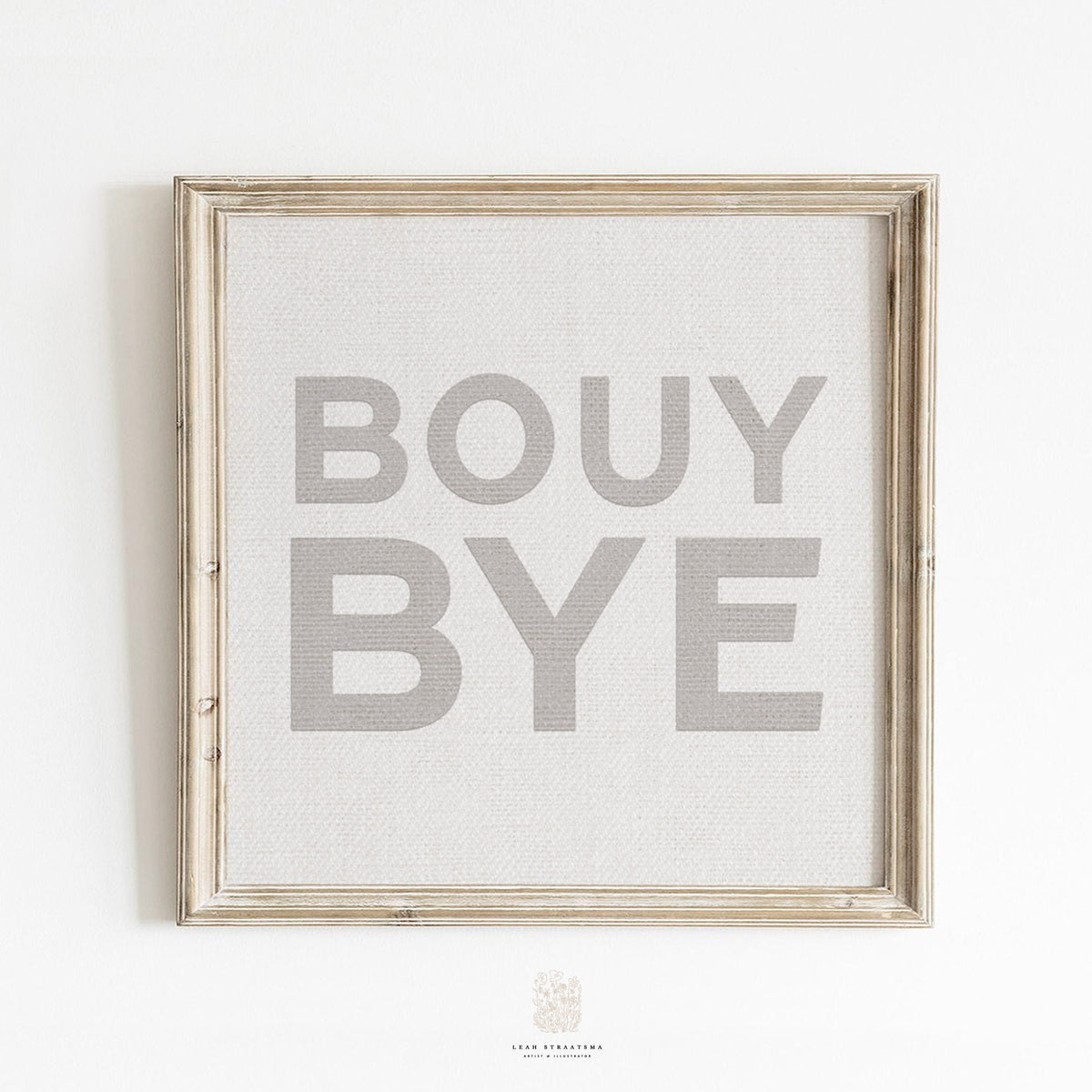 Neutral “BOUY BYE” typography print in light wood frame on white wall, featuring subtle fabric texture and soft coastal tones.