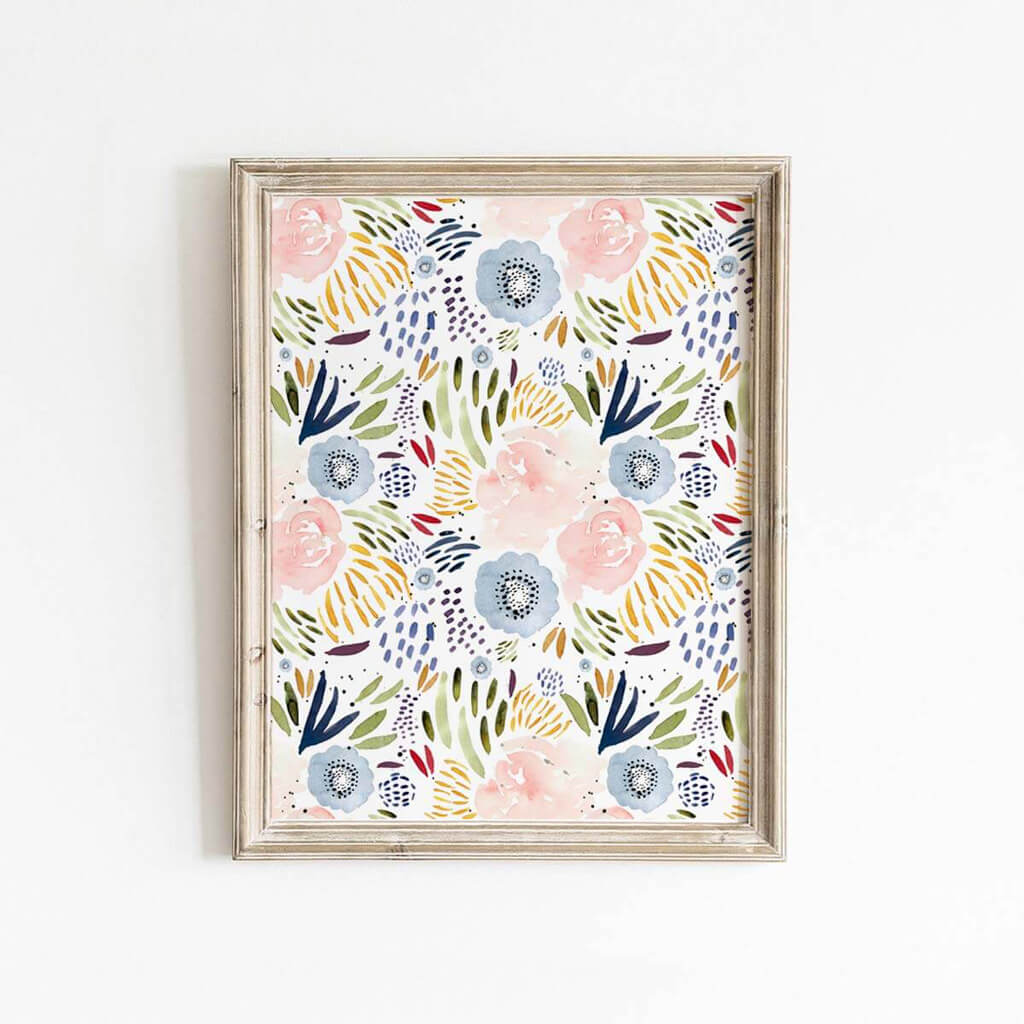 Abstract floral print in pink and blue with accents of yellow, red, and green, perfect for modern home decor.