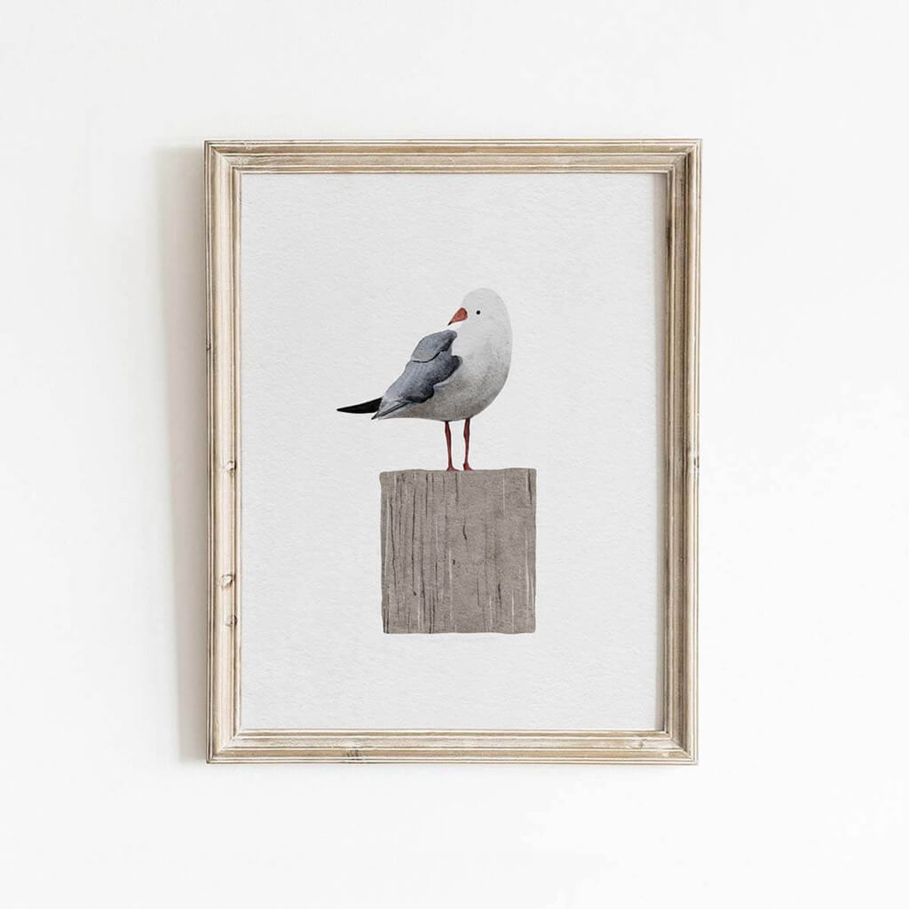 Coastal watercolour painting of a seagull sitting on a wooden post by Leah Straatsma