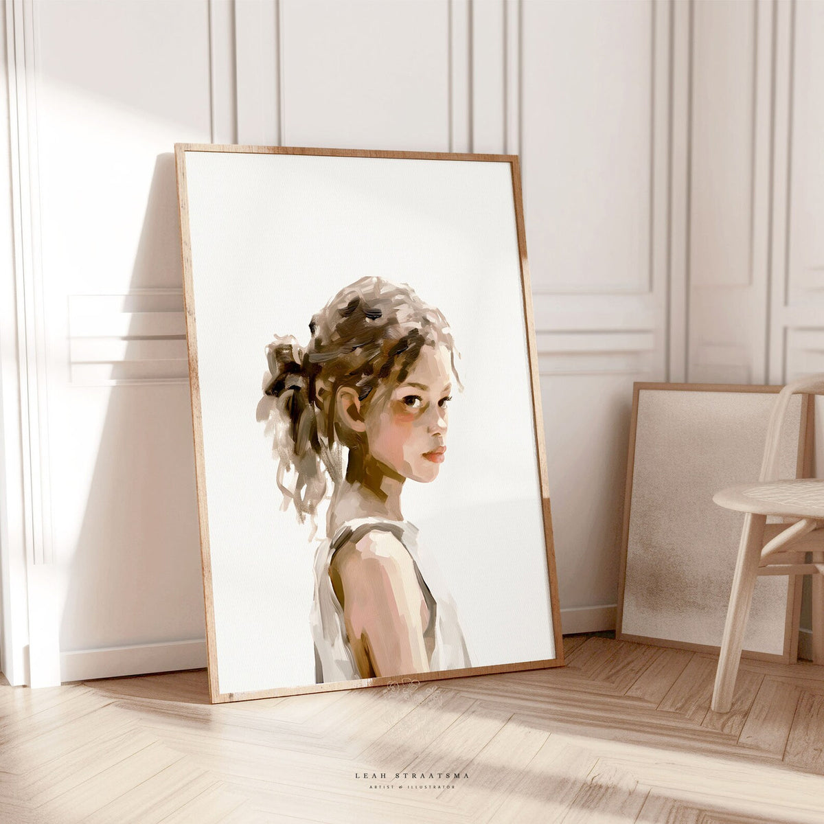 Neutral-toned girl portrait print leaning against wall in soft light, styled with natural wood frame and modern minimal decor—perfect for bedroom or hallway.