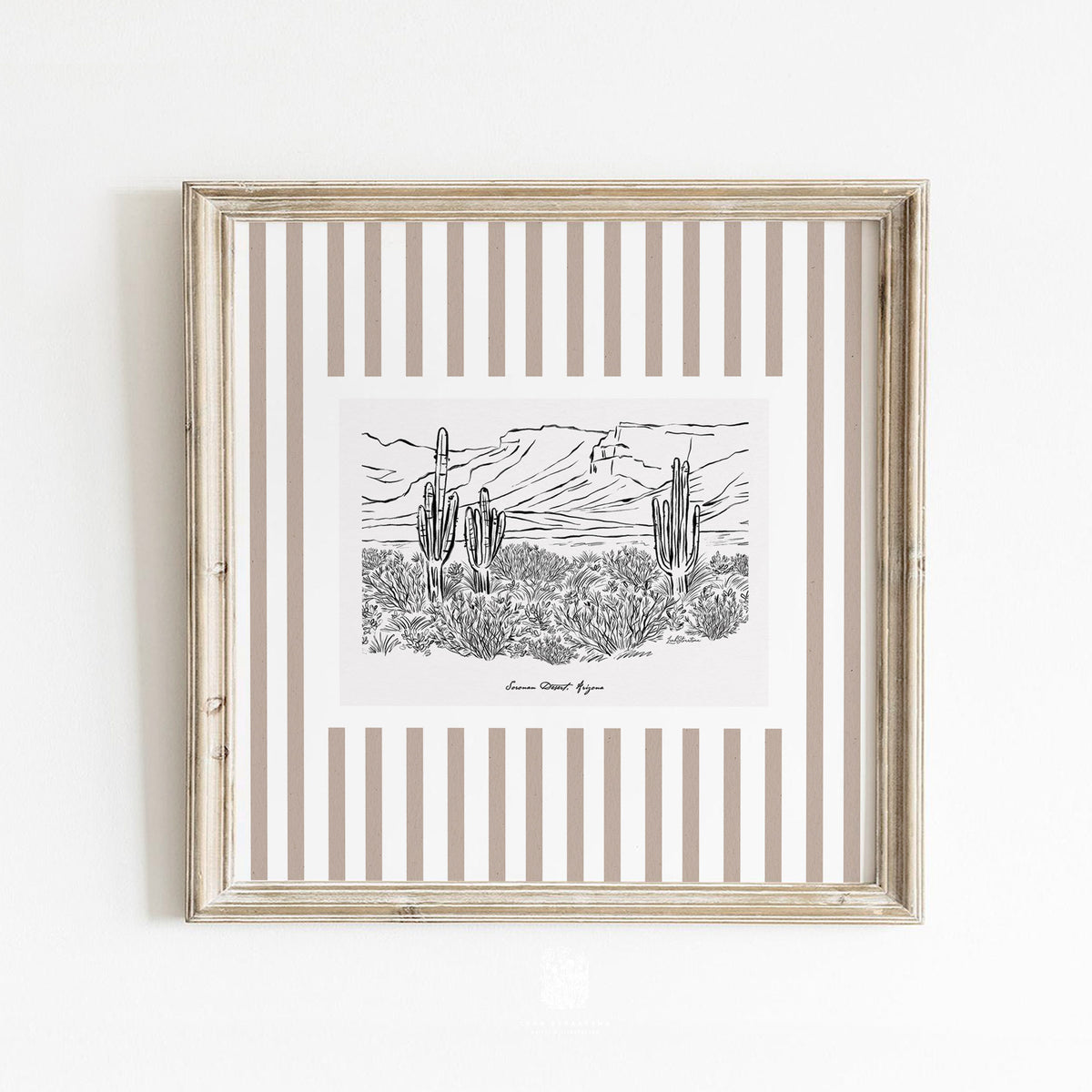 Neutral Sonoran Desert wall art with vertical taupe stripes, styled in a classic frame against a clean white wall for a modern coastal look.